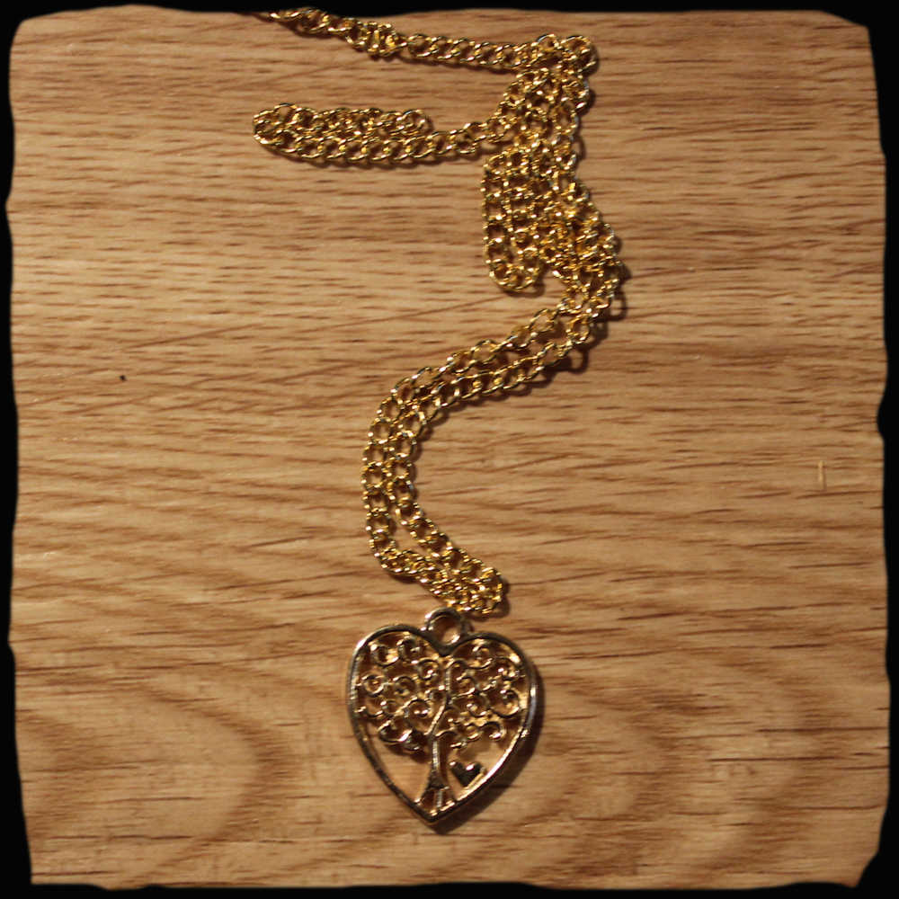 Chaînette medaillon avec pendentif coeur amour en métal argenté or québec canada